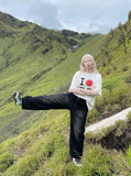 DAXUEN Relaxed fit graphic t-shirt with sunburst and letter print — model photo