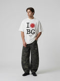 DAXUEN Relaxed fit graphic t-shirt with sunburst and letter print — model photo