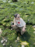 DAXUEN Relaxed fit graphic t-shirt with sunburst and letter print — model photo