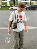 DAXUEN Relaxed fit graphic t-shirt with sunburst and letter print — model photo