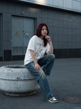 DAXUEN Short-sleeved graphic t-shirt with dog-themed prints — model photo