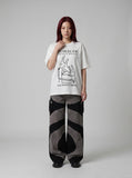 DAXUEN Short-sleeved graphic t-shirt with dog-themed prints — model photo