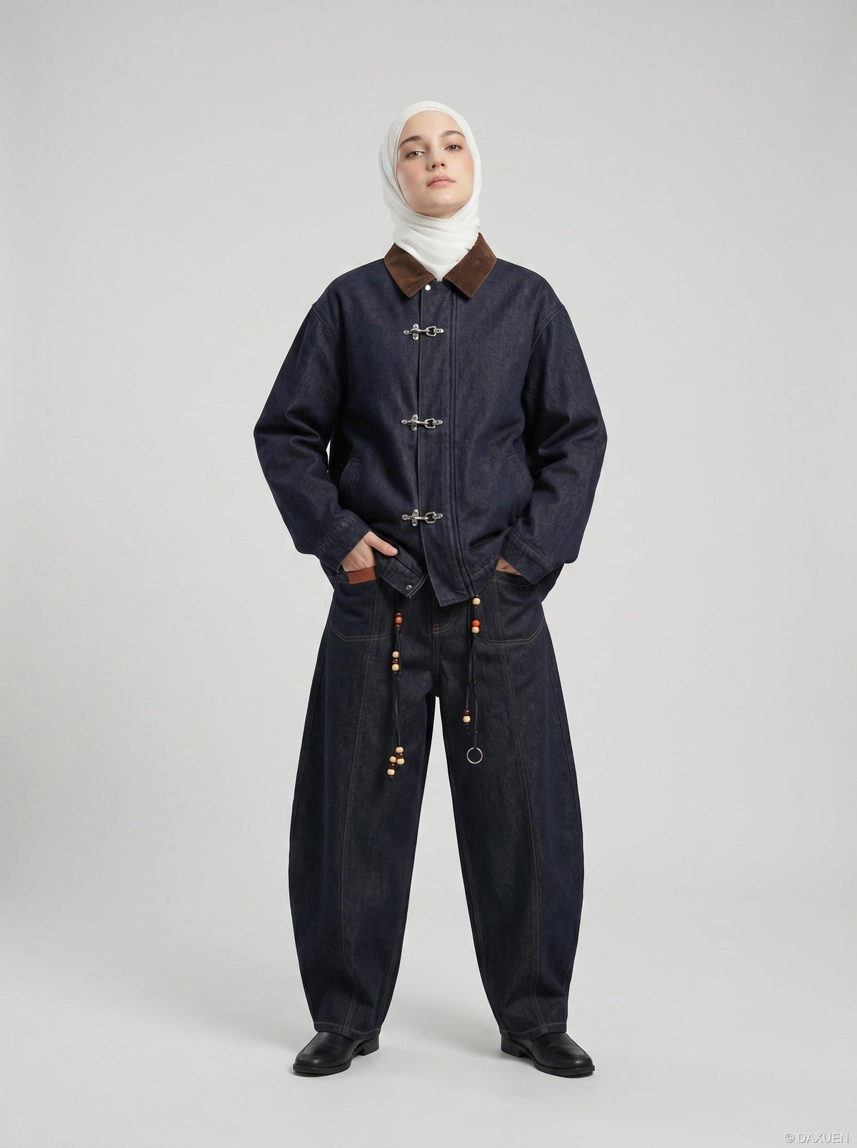 DAXUEN indigo blue denim jacket with brown collar and toggle clasps — model photo