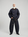 DAXUEN indigo blue denim jacket with brown collar and toggle clasps — model photo