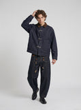 DAXUEN indigo blue denim jacket with brown collar and toggle clasps — model photo