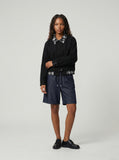 DAXUEN Men's relaxed-fit denim shorts in dark indigo blue — model photo