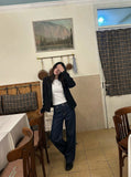 DAXUEN Wide-leg indigo blue jeans with contrast stitching — model photo