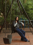 DAXUEN Indigo wide-leg jeans with golden-yellow stitching — model photo