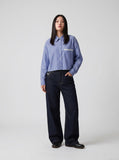 DAXUEN Indigo wide-leg jeans with golden-yellow stitching — model photo