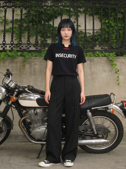 DAXUEN Short-sleeved graphic T-shirt with text prints — model photo