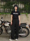 DAXUEN Short-sleeved graphic T-shirt with text prints — model photo