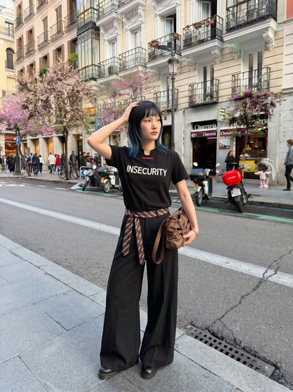 DAXUEN Short-sleeved graphic T-shirt with text prints — model photo