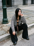 DAXUEN black horizontal stripe intricate cross graphic hoodie sweatshirt — model photo