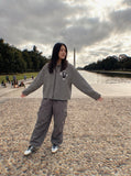 DAXUEN black horizontal stripe intricate cross graphic hoodie sweatshirt — model photo