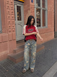 DAXUEN washed blue wide-leg floral print denim jeans — model photo