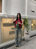DAXUEN washed blue wide-leg floral print denim jeans — model photo