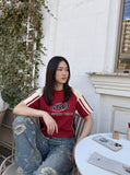 DAXUEN washed blue wide-leg floral print denim jeans — model photo