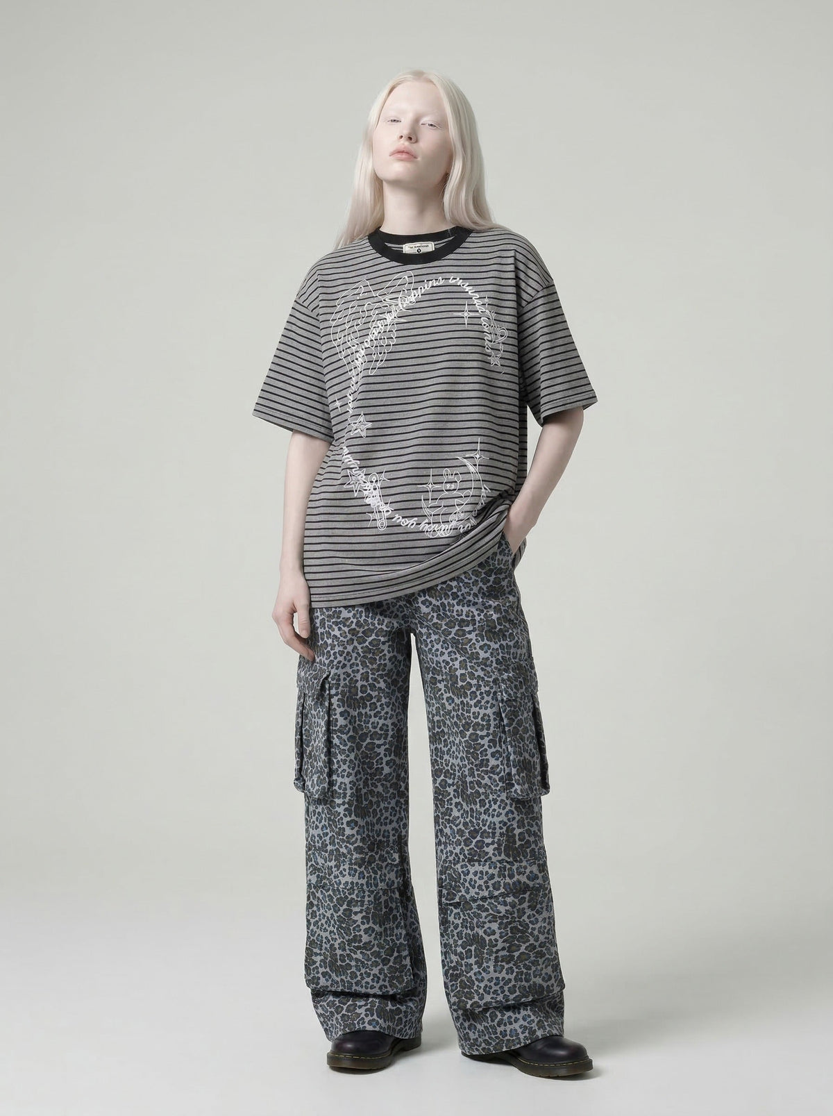 DAXUEN Intricate graphic striped short-sleeved t-shirt — model photo