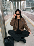 DAXUEN brown oversized jacket with intricate orbital design — model photo