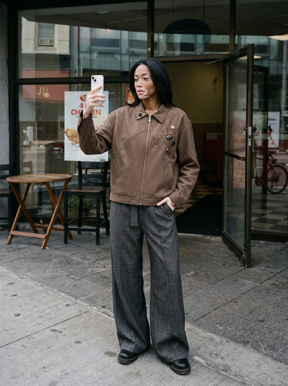 DAXUEN brown oversized jacket with intricate orbital design — model photo