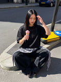 DAXUEN dark grey oversized intricate tonal graphic tee — model photo