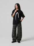 DAXUEN black oversized inverted U-graphic T-shirt — model photo