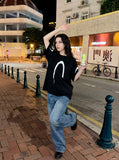 DAXUEN black oversized inverted U-graphic T-shirt — model photo