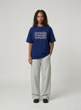 DAXUEN navy blue oversized italicized-serif graphic t-shirt — model photo