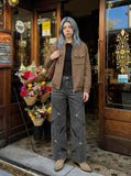 DAXUEN Wide-leg jeans with cut-out panels and stone-washed finish — model photo