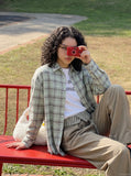 DAXUEN khaki wide-leg trousers with checkered waistband — model photo