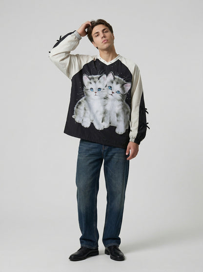 DAXUEN Black oversized pullover with kitten graphic and studs — model photo