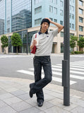 DAXUEN Knitted polo shirt with a dog logo — model photo