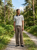 DAXUEN Knitted polo shirt with a dog logo — model photo