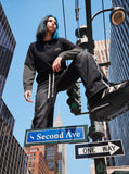 DAXUEN black layered long-sleeve tee with striped sleeves — model photo