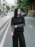 DAXUEN black layered long-sleeve tee with striped sleeves — model photo