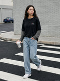 DAXUEN black layered long-sleeve tee with striped sleeves — model photo