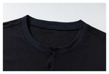 DAXUEN black layered long-sleeve tee with striped sleeves