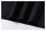 DAXUEN black layered long-sleeve tee with striped sleeves