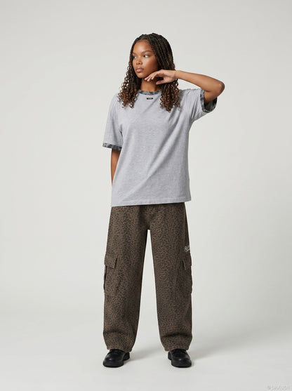 DAXUEN Men's relaxed-fit heather grey t-shirt — model photo