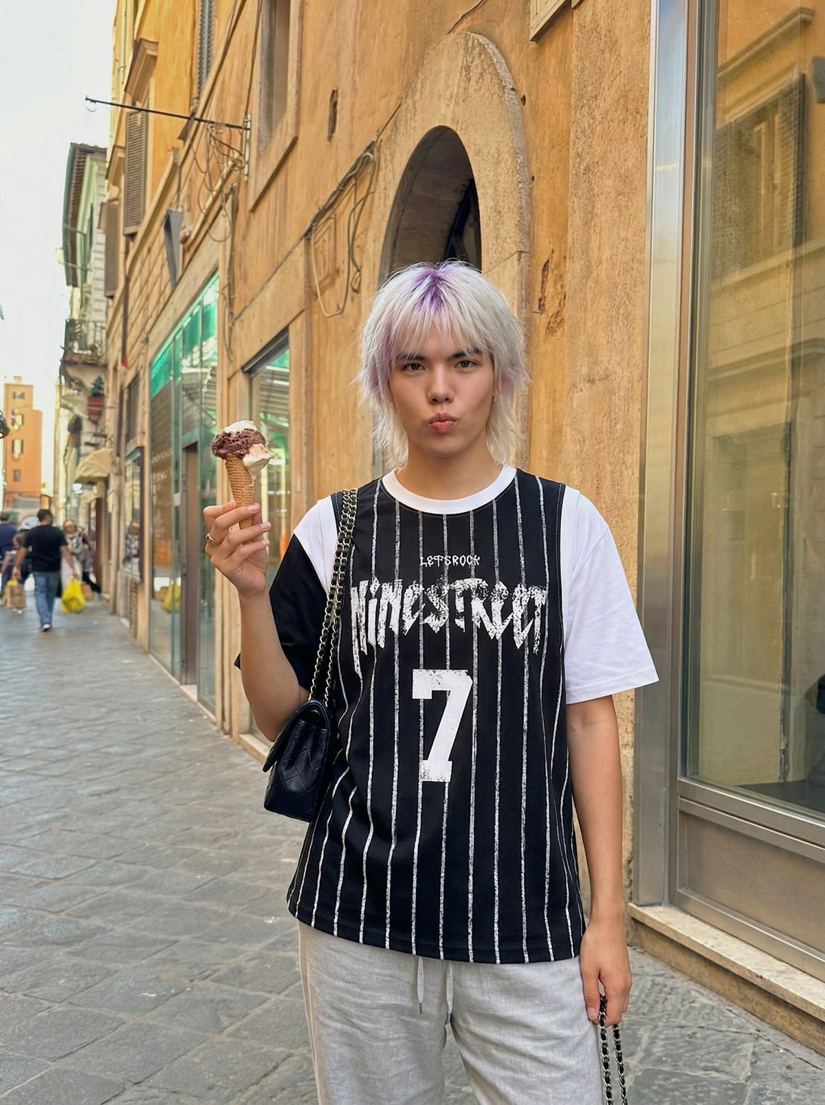 DAXUEN Layered distressed graphic t-shirt with tank top — model photo