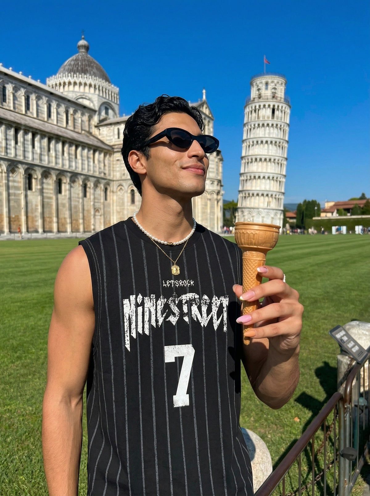 DAXUEN Layered distressed graphic t-shirt with tank top — model photo