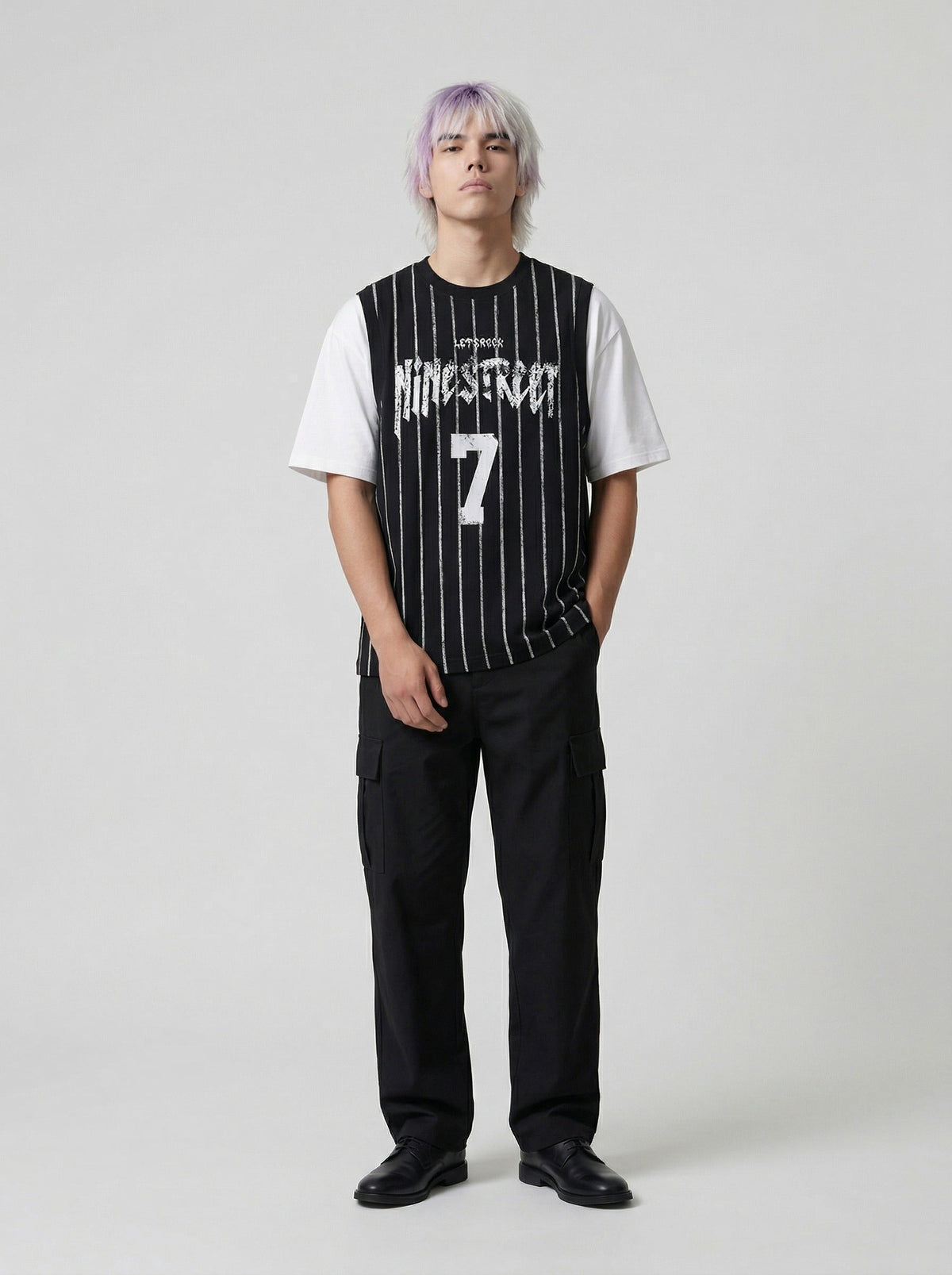 DAXUEN Layered distressed graphic t-shirt with tank top — model photo
