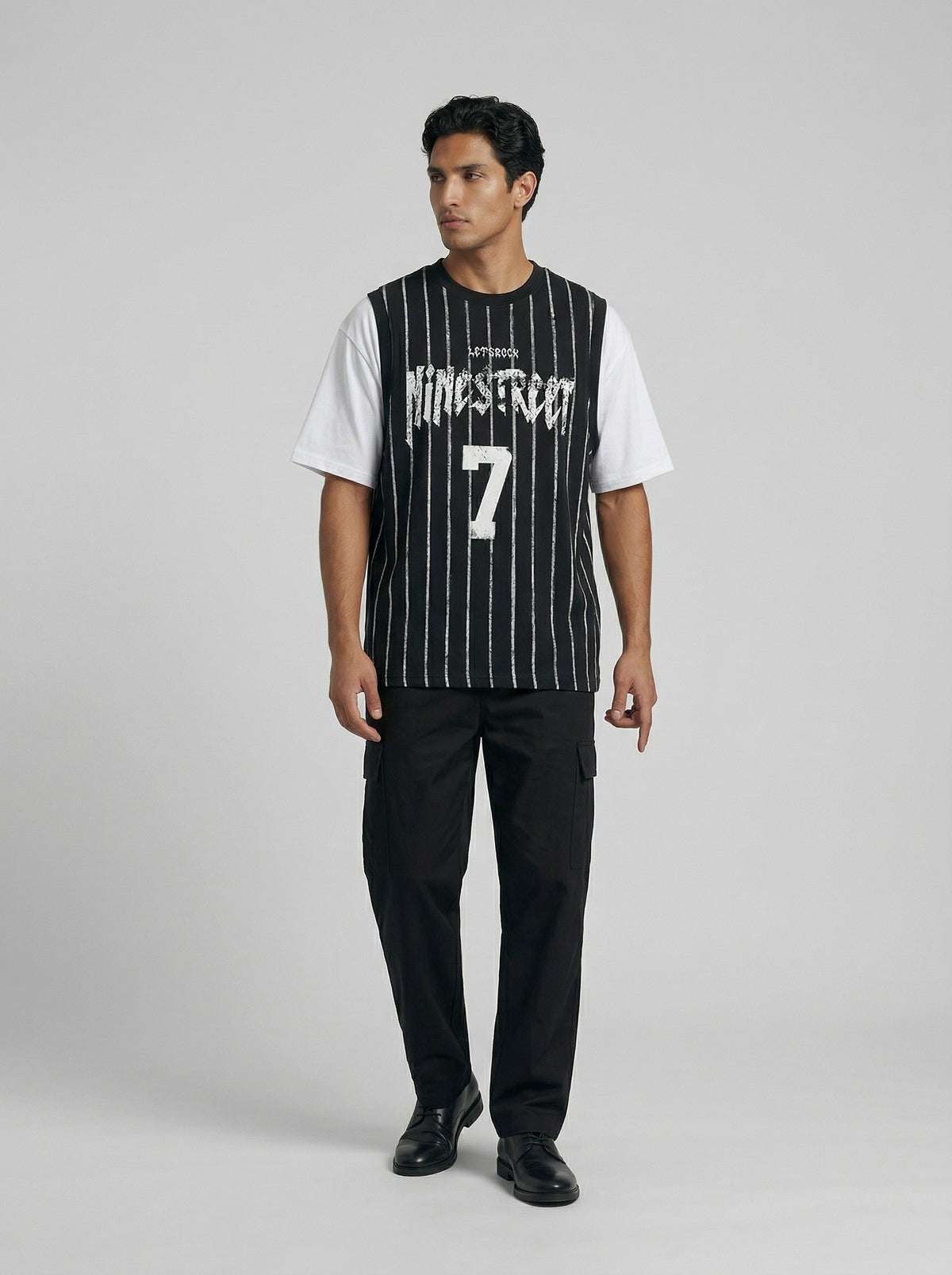 DAXUEN Layered distressed graphic t-shirt with tank top — model photo