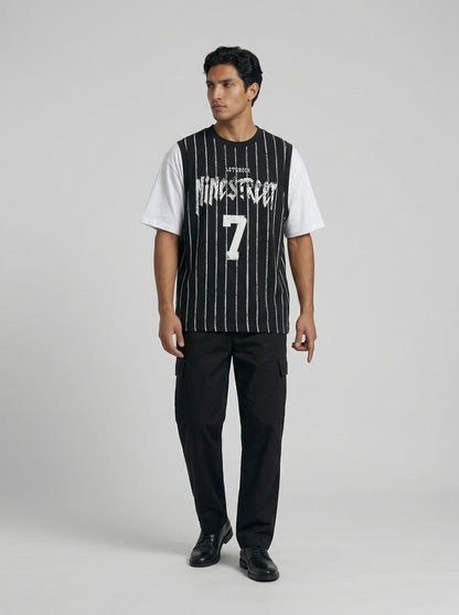 DAXUEN Layered distressed graphic t-shirt with tank top — model photo