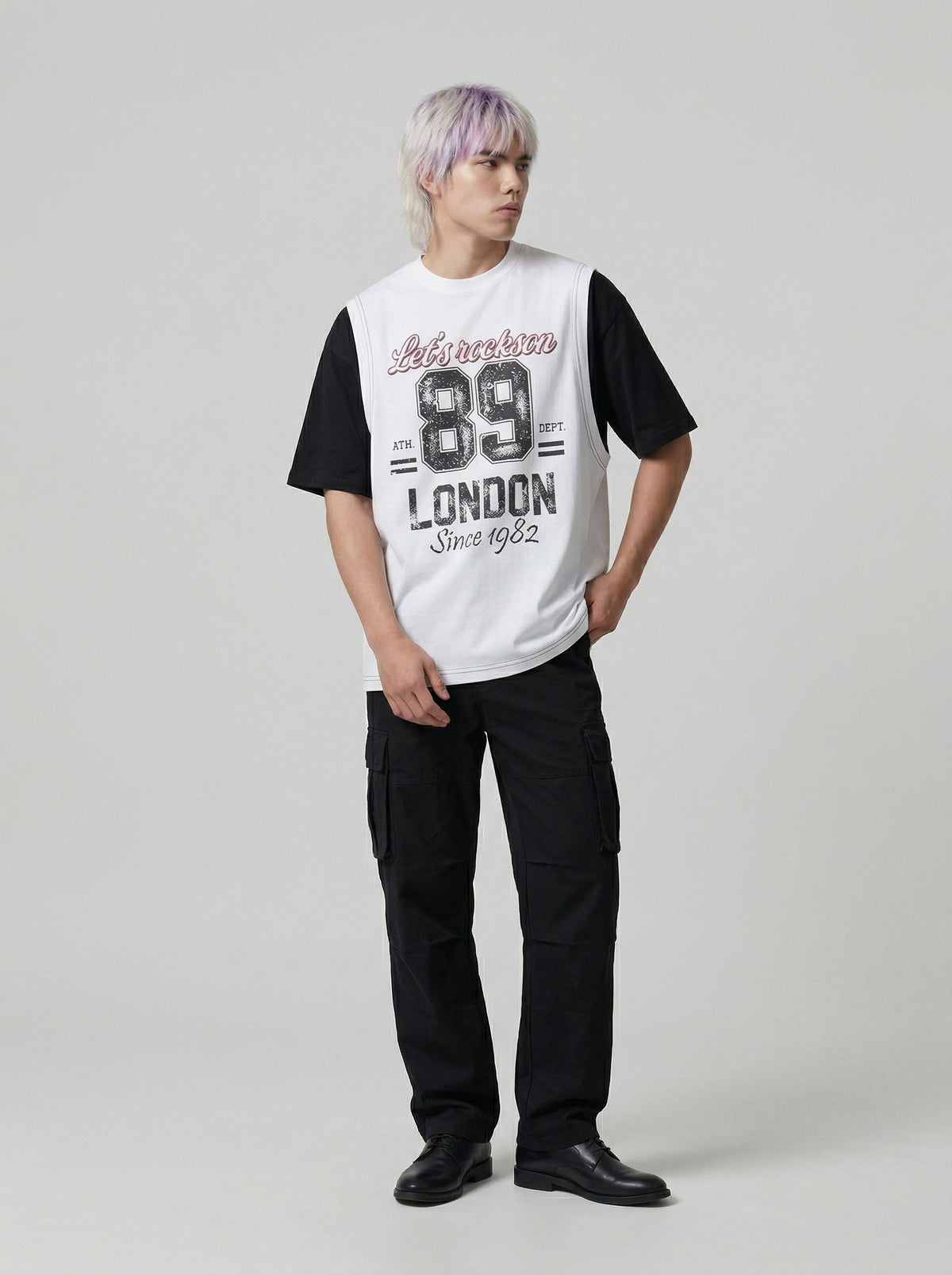 DAXUEN Layered graphic t-shirt and sleeveless vest combo — model photo