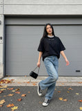 DAXUEN Oversized short-sleeved T-shirt with layered neckline design — model photo