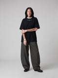 DAXUEN Oversized short-sleeved T-shirt with layered neckline design — model photo