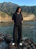 DAXUEN Oversized short-sleeved T-shirt with layered neckline design — model photo