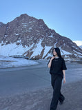 DAXUEN Oversized short-sleeved T-shirt with layered neckline design — model photo