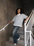 DAXUEN Short-sleeved relaxed-fit polo shirt with faux layered design — model photo